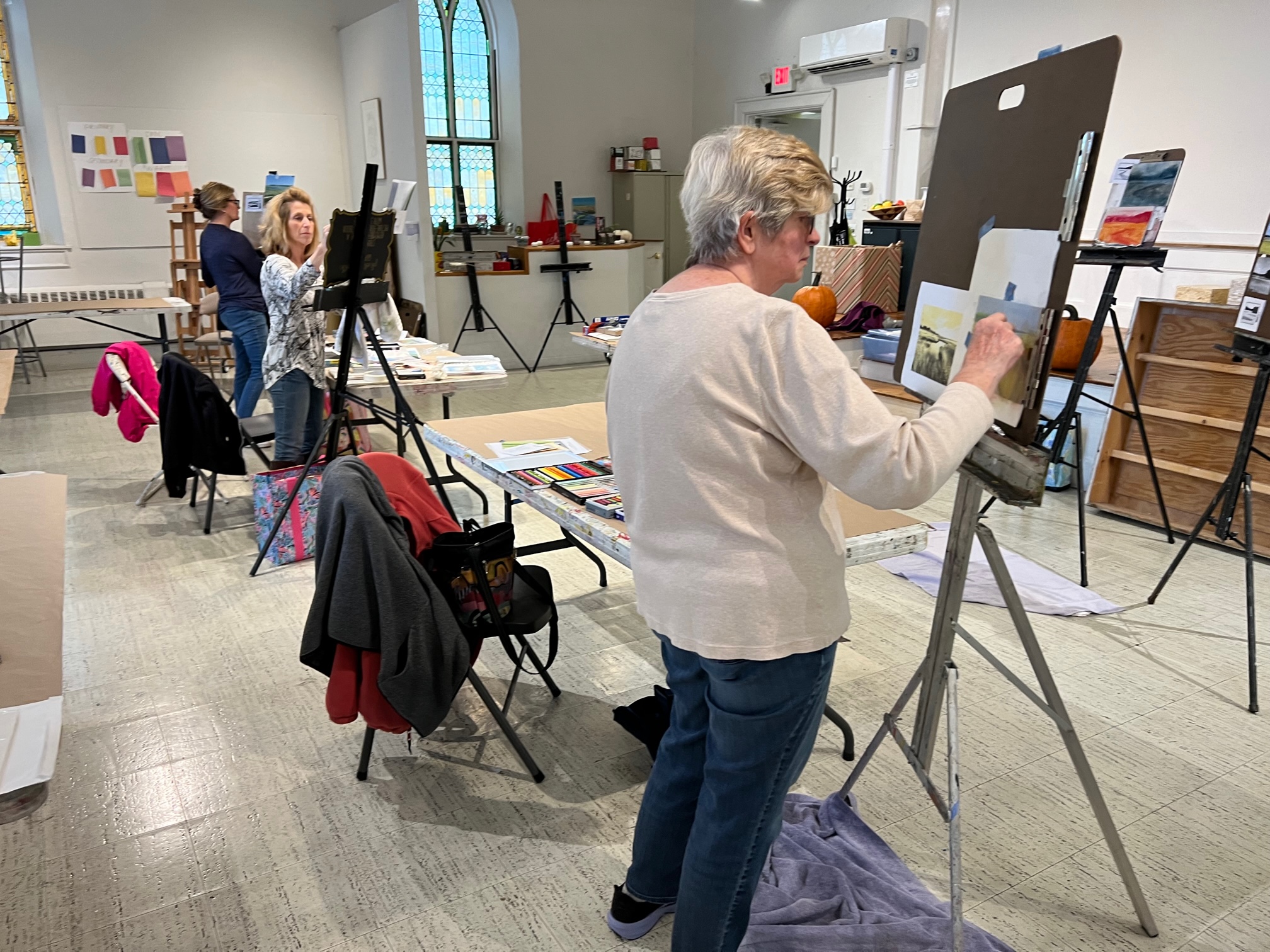 Cheryl O’Neil Pastel 1 Older Adults painting on easels
